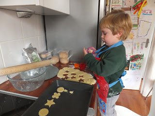 My son making gluten free cheese biscuits