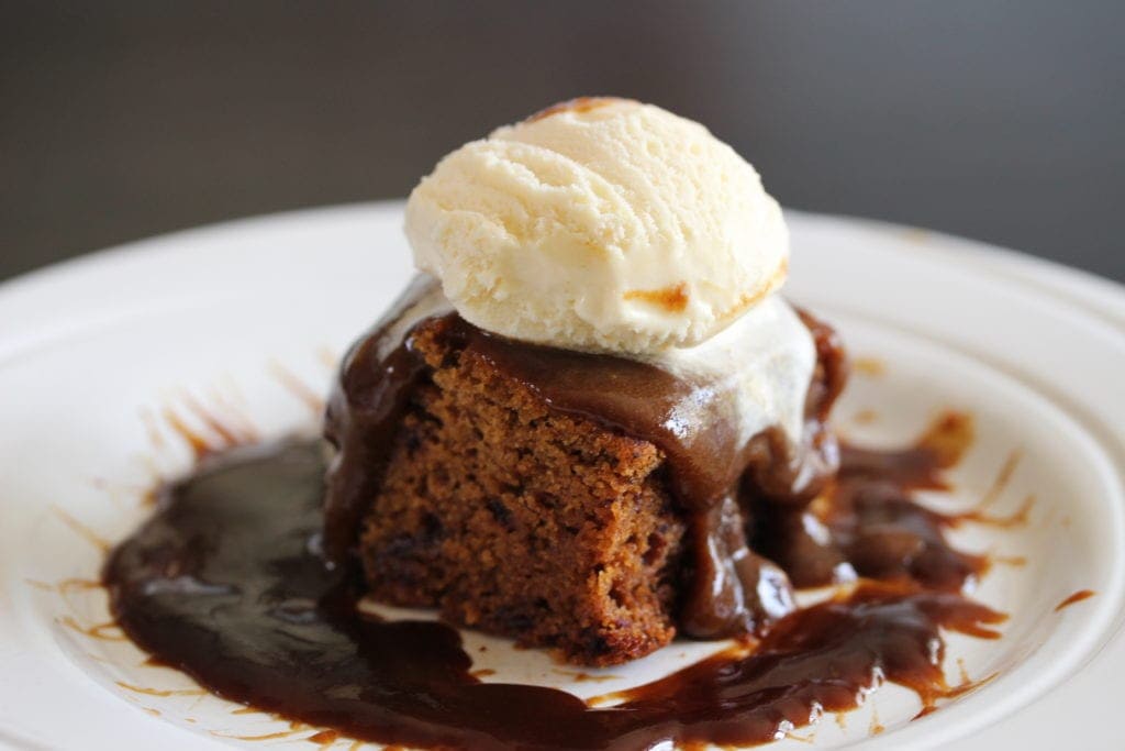 A perfect sticky toffee pudding with ice cream on top. #glutenfree #dairyfree #stickytoffeepudding #stickytoffeedesert #freefromfairy