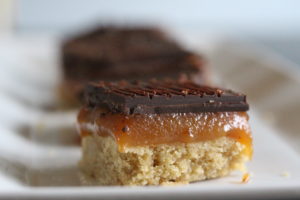 Dairy free caramel slice by the Free From Fairy. This decadent treat is made with wholegrain gluten free flour from the Free From Fairy. #glutenfree #dairyfree #vegan #vegancaramel #freefromfairy #chocolatecaramel #freefrom