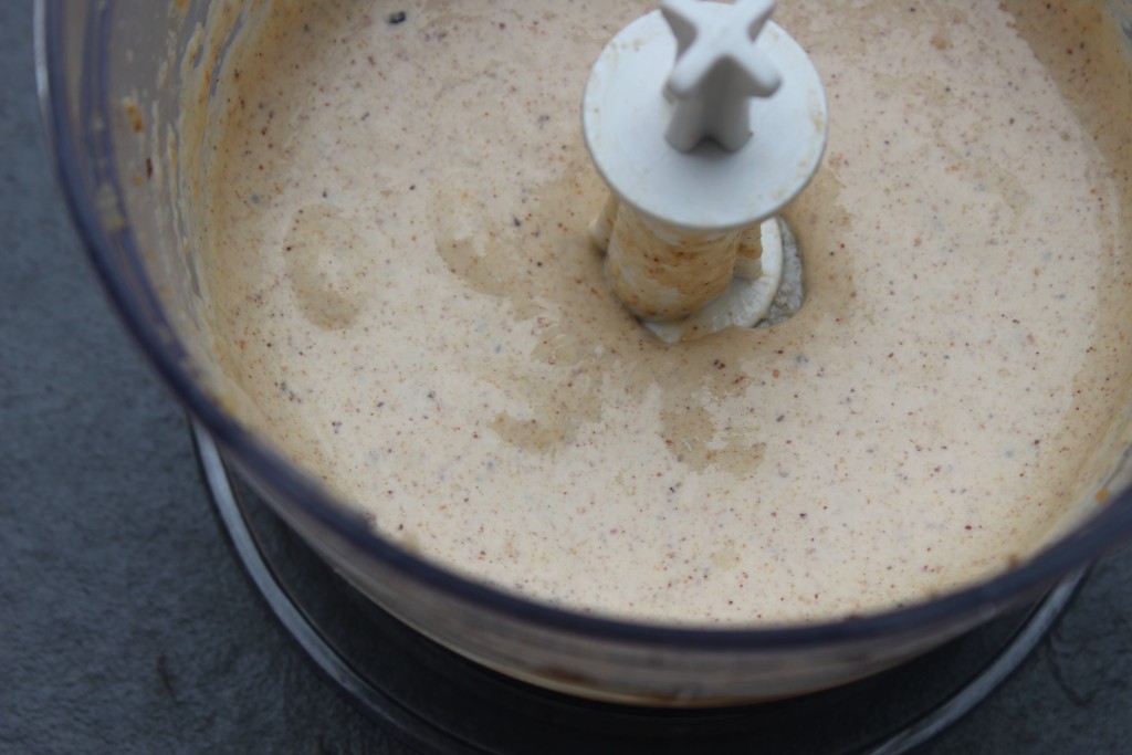 The thick mixture for flourless banana pancakes that contains banana, nuts and egg.