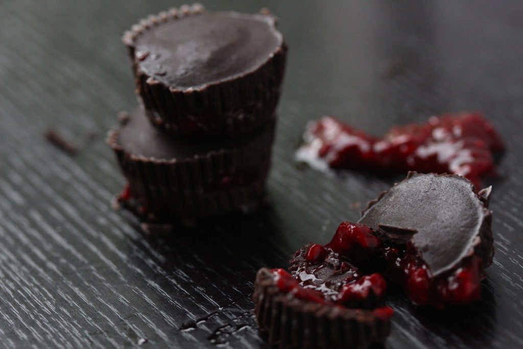 Make your own Halloween chocolates filled with 'blood'! These chocolates are free from the top allergens and also sugar (sweetened with a little honey).