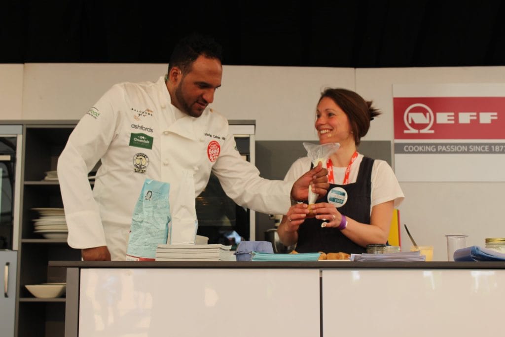 Vicki Montague on stage with Michael Caines. Learn how to cook with one of my online gluten free cookery lessons.