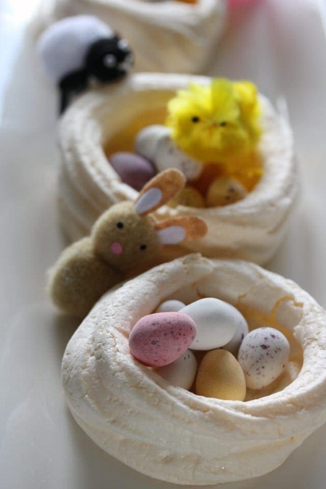 Meringue nest with mini eggs and baby animals