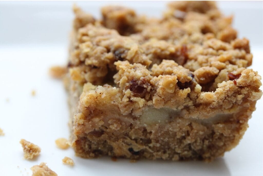 A close up of gluten free apple crumble flapjacks with no refined sugar