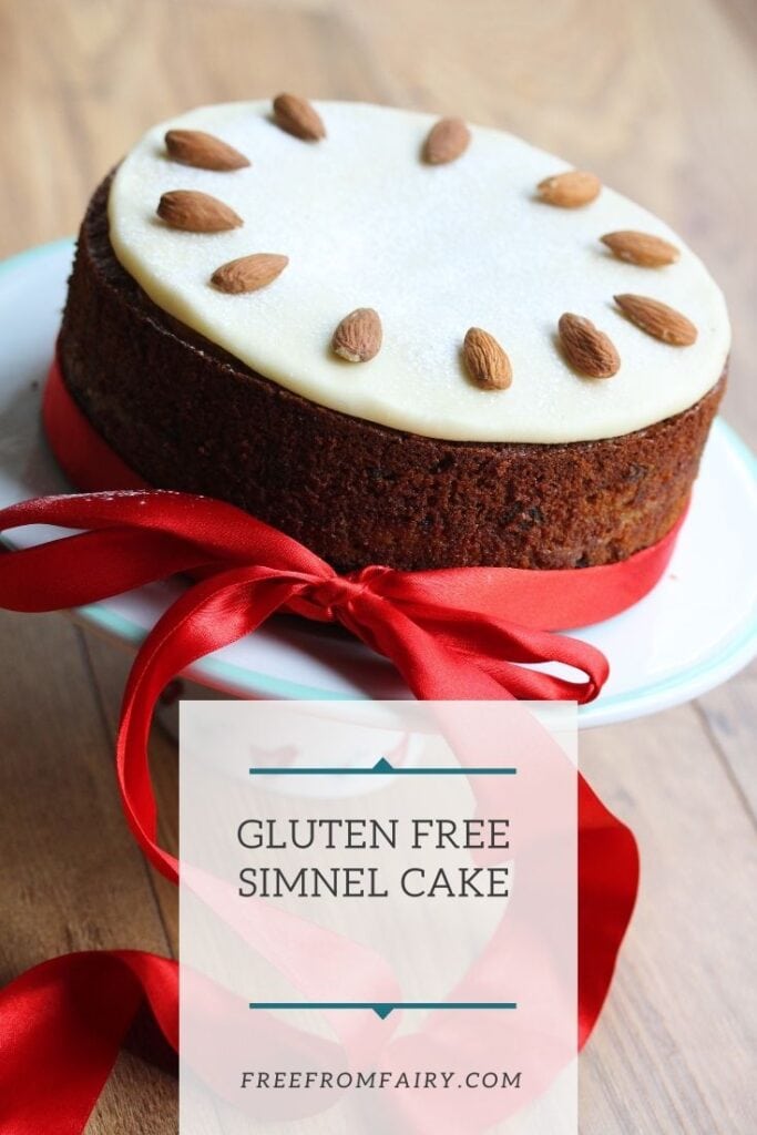 Gluten free simnel cake. A rich, moist gluten free fruit cake with marzipan baked in the middle and a marzipan disk on the top. #glutenfreeeaster #glutenfreeeasterrecipe #glutenfreesimnelcake #freefromfairy