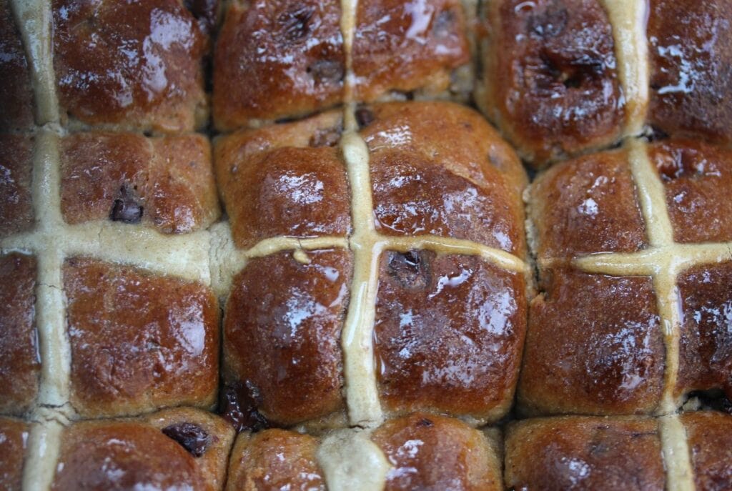 Sticky gluten free fruitless hot cross buns - photograph taken from above.